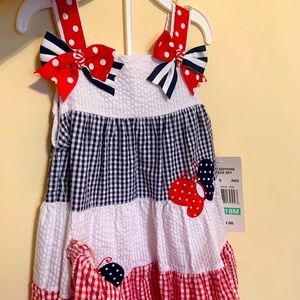 Brand new with tags girls dress with matching bottom. Red white and blue.